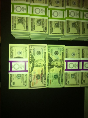 Actual bills on top of our stacks to show size